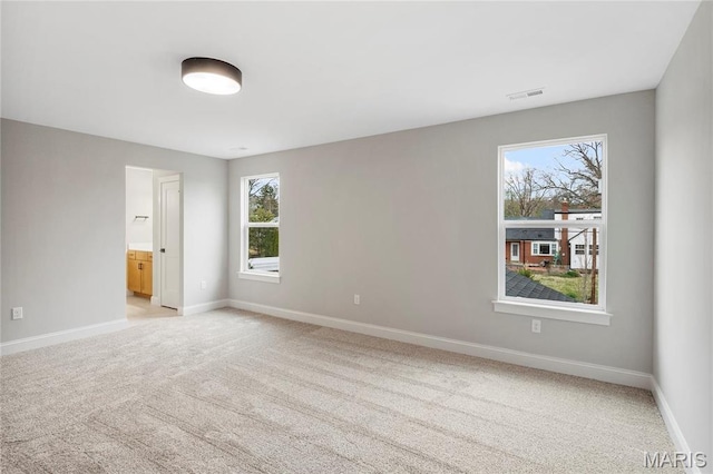19 Beaver Dr, Creve Coeur, MO 63141 - unfurnished room with baseboards and light carpet