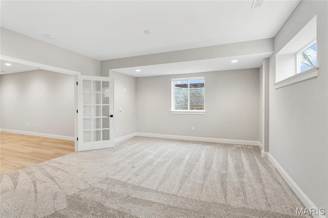 19 Beaver Dr, Creve Coeur, MO 63141 - below grade area with plenty of natural light, carpet flooring, baseboards, and recessed lighting