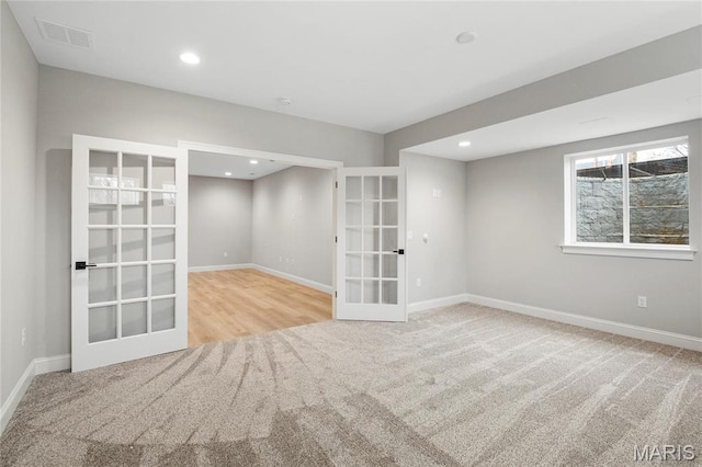 19 Beaver Dr, Creve Coeur, MO 63141 - carpeted spare room featuring french doors, baseboards, and recessed lighting