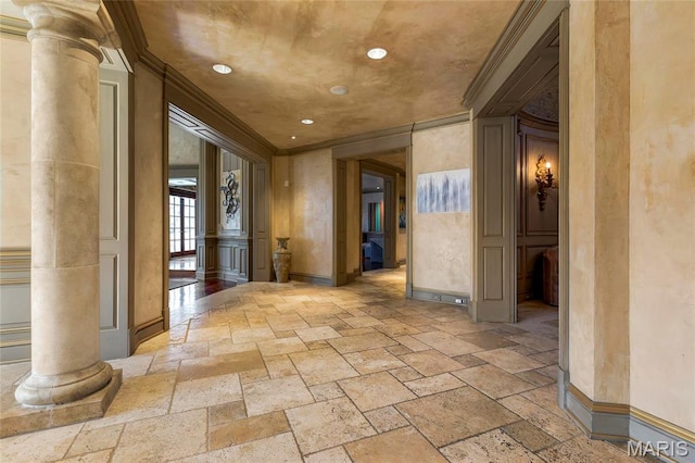 1290 Dry Ridge Rd, Town And Country, MO 63131 - hall with decorative columns, stone tile flooring, crown molding, and recessed lighting