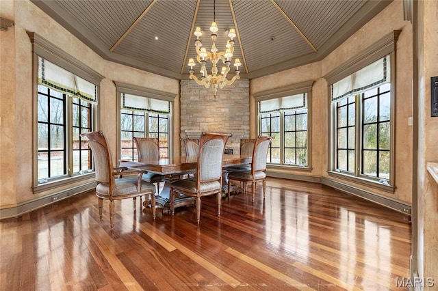 1290 Dry Ridge Rd, Town And Country, MO 63131 - dining space with hardwood / wood-style flooring, wooden ceiling, a chandelier, ornamental molding, and lofted ceiling
