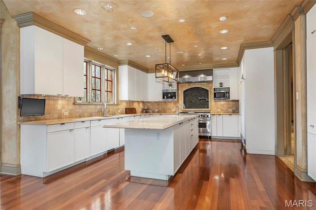 1290 Dry Ridge Rd, Town And Country, MO 63131 - kitchen featuring dark wood-style flooring, stainless steel appliances, ornamental molding, a kitchen island, and white cabinets