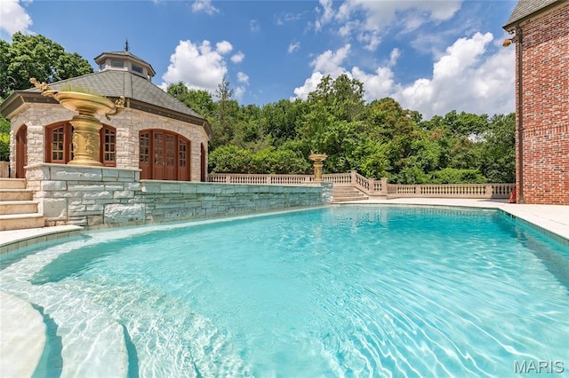 1290 Dry Ridge Rd, Town And Country, MO 63131 - view of swimming pool with an outbuilding