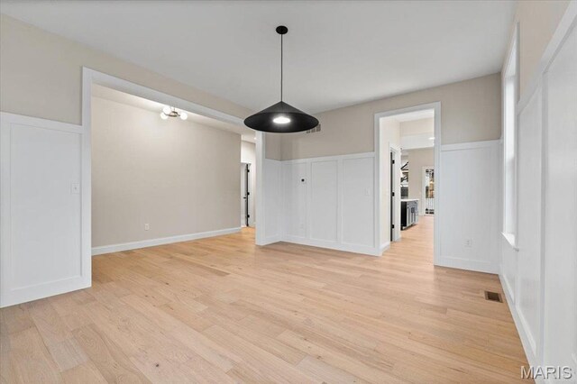 710 Angenette Ave, Kirkwood, MO 63122 - unfurnished dining area featuring light wood-style floors