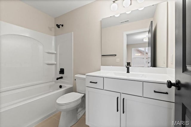 710 Angenette Ave, Kirkwood, MO 63122 - bathroom featuring toilet, tub / shower combination, vanity, and tile patterned floors