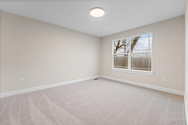 710 Angenette Ave, Kirkwood, MO 63122 - unfurnished room featuring carpet and baseboards