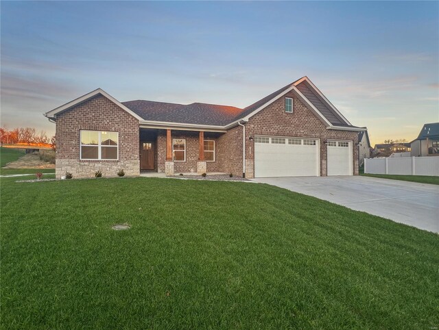 205 Stonebridge Bluff Dr, Maryville, IL 62062 - single story home with an attached garage, driveway, brick siding, and a shingled roof