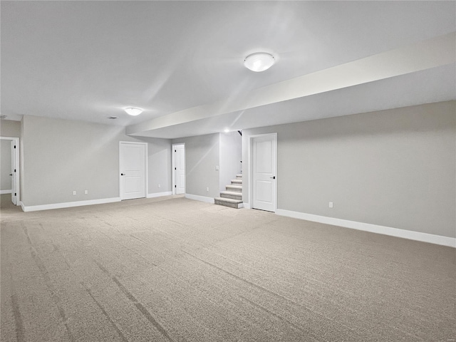 205 Stonebridge Bluff Dr, Maryville, IL 62062 - finished below grade area with carpet floors, baseboards, and stairs