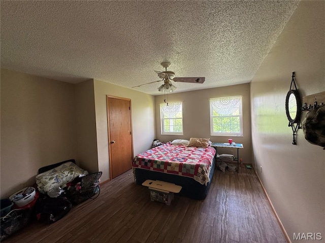 9747 Wayne Route P, Mcgee, MO 63763 - bedroom featuring wood finished floors, a textured ceiling, and ceiling fan