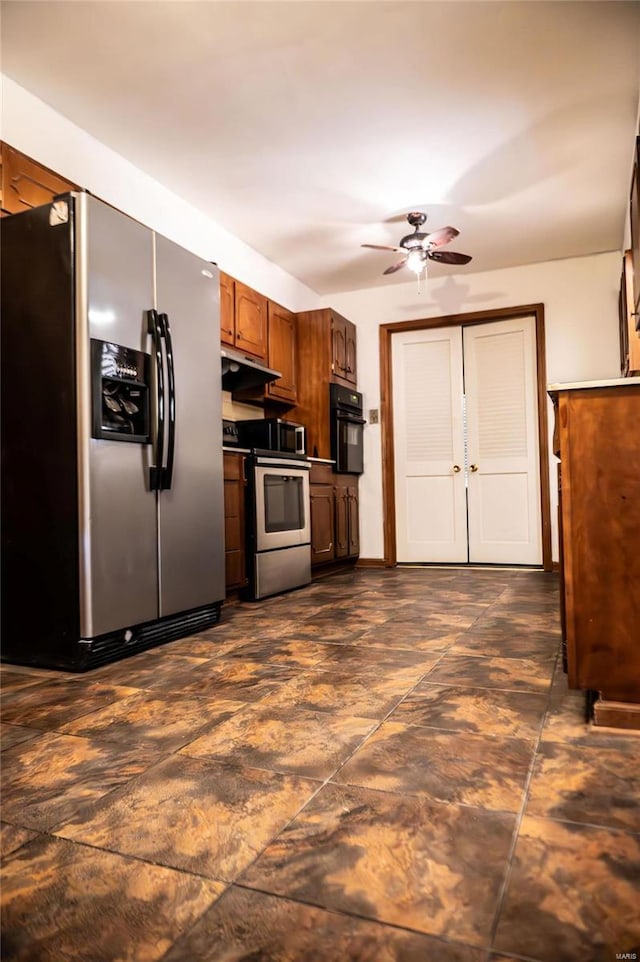 kitchen with appliances with stainless steel finishes and ceiling fan