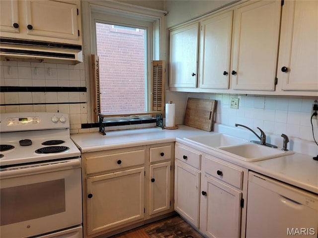 4877 Calvin Ave, Saint Louis, MO 63115 - kitchen featuring white appliances, a sink, backsplash, and range hood