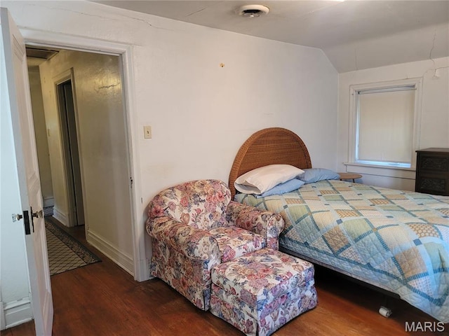 4877 Calvin Ave, Saint Louis, MO 63115 - bedroom with wood finished floors and lofted ceiling