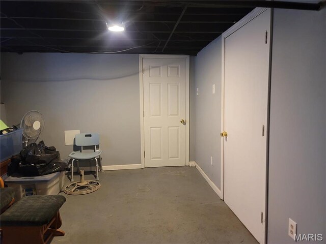 4877 Calvin Ave, Saint Louis, MO 63115 - finished basement featuring baseboards