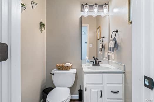 825 Cimarron Cir, Farmington, MO 63640 - bathroom with vanity and toilet