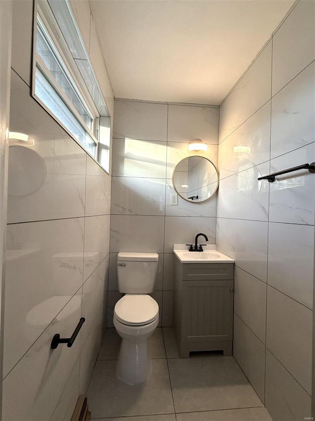 5011 Courtside Dr, Imperial, MO 63052 - bathroom with tile walls, tile patterned flooring, vanity, and toilet