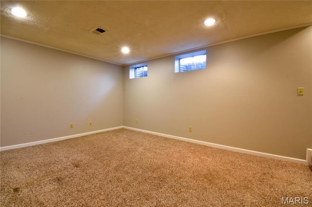 1103 Hampton Ct, Belleville, IL 62223 - basement featuring ornamental molding, recessed lighting, carpet floors, and baseboards
