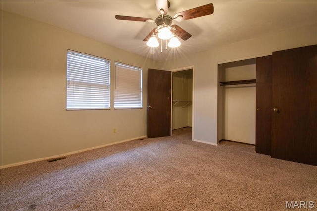 1103 Hampton Ct, Belleville, IL 62223 - unfurnished bedroom featuring carpet, baseboards, a ceiling fan, and a closet