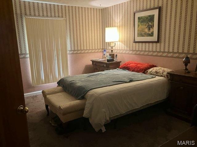 36180 State Highway 25, Malden, MO 63863 - bedroom with wallpapered walls, carpet flooring, and baseboards