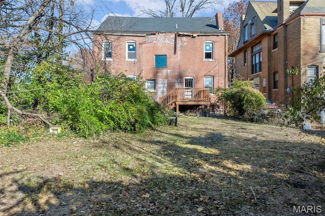 5872 Cabanne Ave, Saint Louis, MO 63112 - rear view of property with a lawn and a chimney