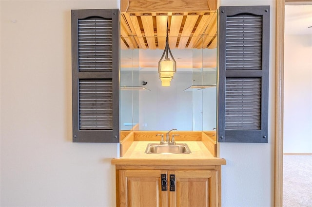 49 Aqua Finn Dr Unit 4A, Lake Ozark, MO 65049 - bathroom with vanity and wood ceiling