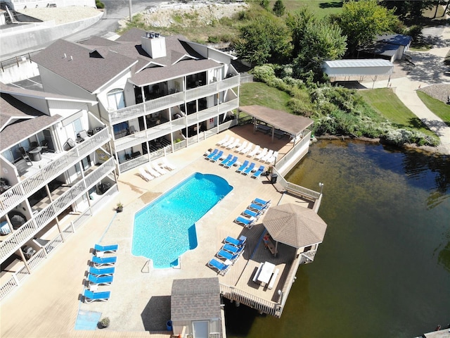 49 Aqua Finn Dr Unit 4A, Lake Ozark, MO 65049 - bird's eye view of a pool area and a nearby body of water