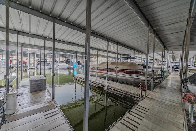 49 Aqua Finn Dr Unit 4A, Lake Ozark, MO 65049 - dock area featuring a water view and boat lift