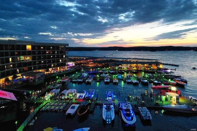 49 Aqua Finn Dr Unit 4A, Lake Ozark, MO 65049 - aerial view at dusk of a water view and view of marina