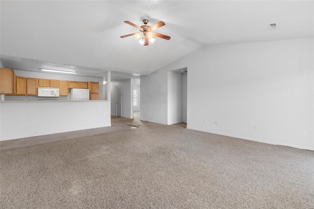 21011 Homer Rd Unit A & B, Saint Robert, MO 65584 - unfurnished living room featuring ceiling fan, light carpet, vaulted ceiling, and baseboards