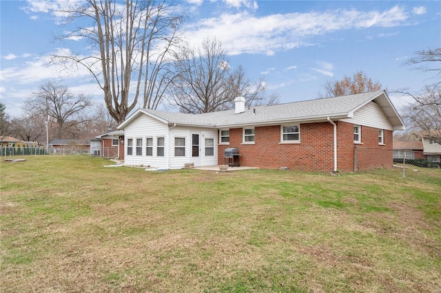 649 Springdale Dr, Belleville, IL 62223 - back of house featuring brick siding, a chimney, a patio, and roof with shingles
