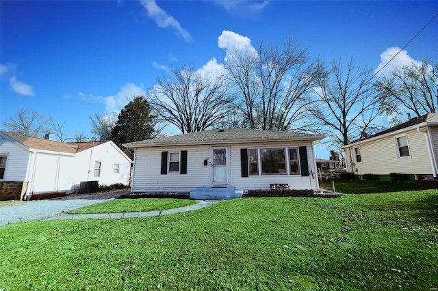712 Greenwood Pl, Collinsville, IL 62234 - view of front of home featuring a front lawn and central AC