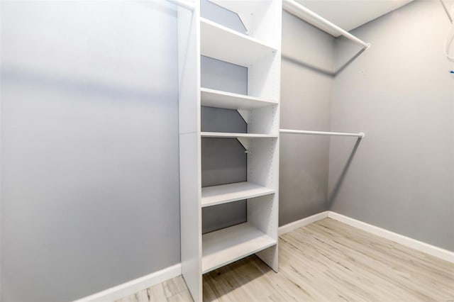 712 Greenwood Pl, Collinsville, IL 62234 - walk in closet featuring wood finished floors