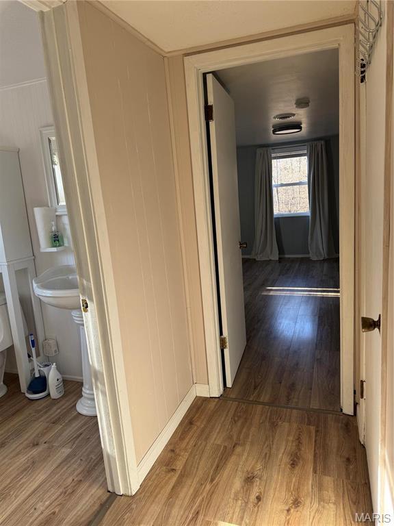 839 Bluebird Ln, Doniphan, MO 63935 - corridor with wood finished floors