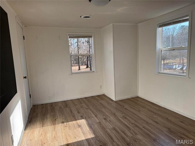 839 Bluebird Ln, Doniphan, MO 63935 - empty room featuring wood finished floors and baseboards