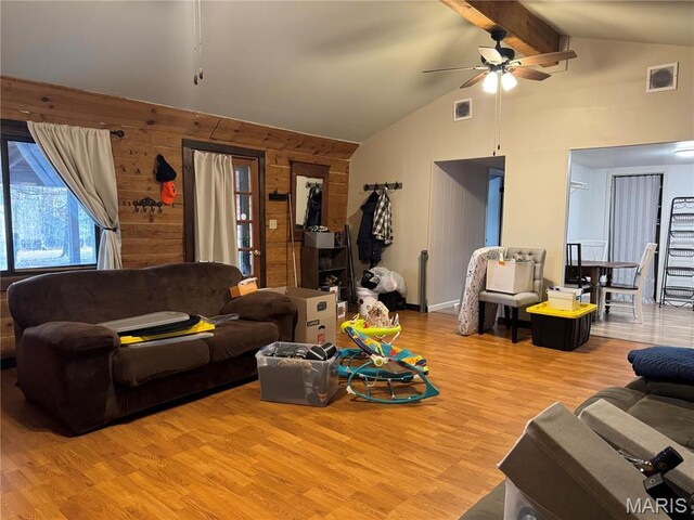 839 Bluebird Ln, Doniphan, MO 63935 - living area with ceiling fan, wood finished floors, and wood walls