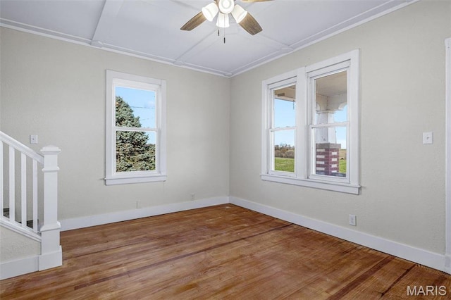 12449 Quarry Town Rd, Saint Genevieve, MO 63670 - unfurnished room with a ceiling fan, wood finished floors, stairway, and baseboards