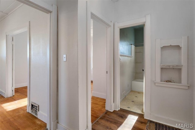12449 Quarry Town Rd, Saint Genevieve, MO 63670 - hall featuring wood finished floors and baseboards