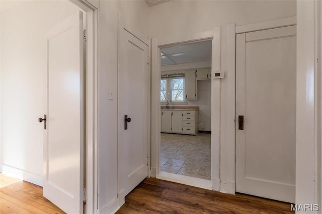 12449 Quarry Town Rd, Saint Genevieve, MO 63670 - hall with wood finished floors and a sink