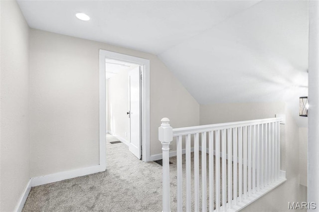 12449 Quarry Town Rd, Saint Genevieve, MO 63670 - corridor featuring carpet, vaulted ceiling, baseboards, and an upstairs landing