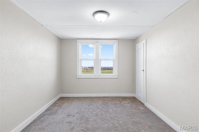 12449 Quarry Town Rd, Saint Genevieve, MO 63670 - carpeted spare room featuring baseboards and a textured wall