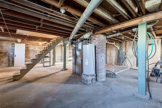 12449 Quarry Town Rd, Saint Genevieve, MO 63670 - unfinished basement with water heater and stairs