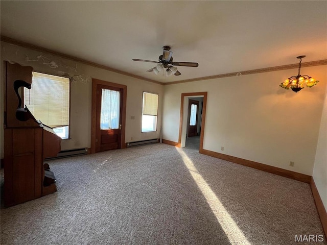 315 E Madison St, Paris, MO 65275 - unfurnished living room featuring carpet floors, baseboard heating, a ceiling fan, and crown molding