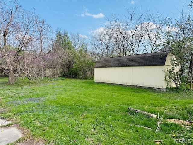 315 E Madison St, Paris, MO 65275 - view of green lawn with an outbuilding and a storage unit