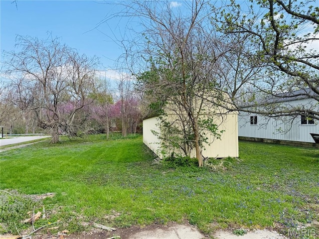 315 E Madison St, Paris, MO 65275 - view of grassy yard with an outbuilding