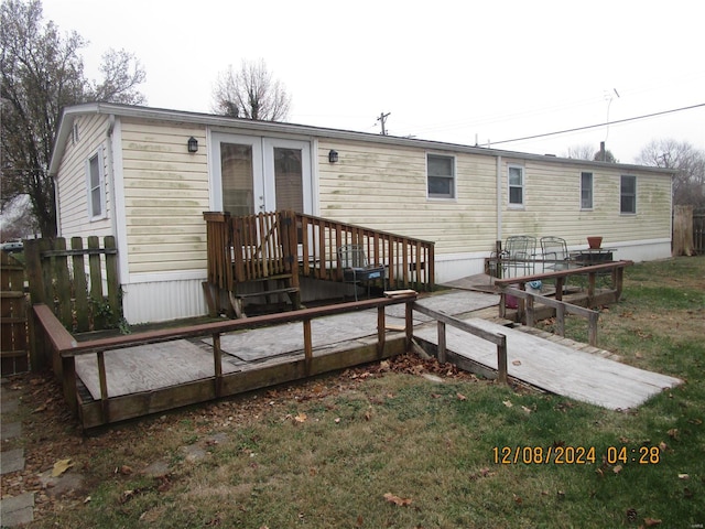 back of house with french doors