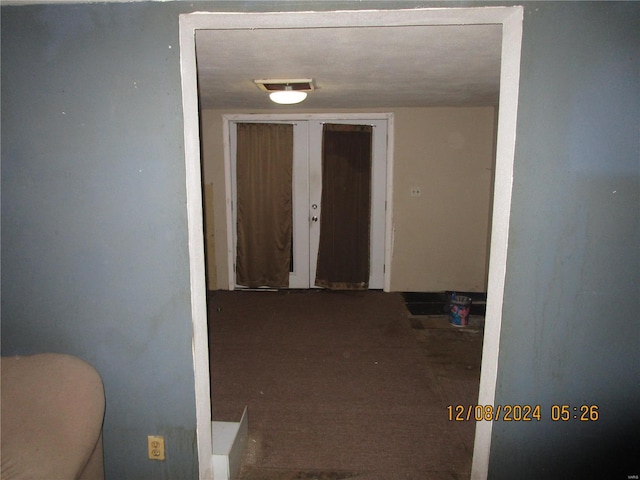 hall with carpet floors