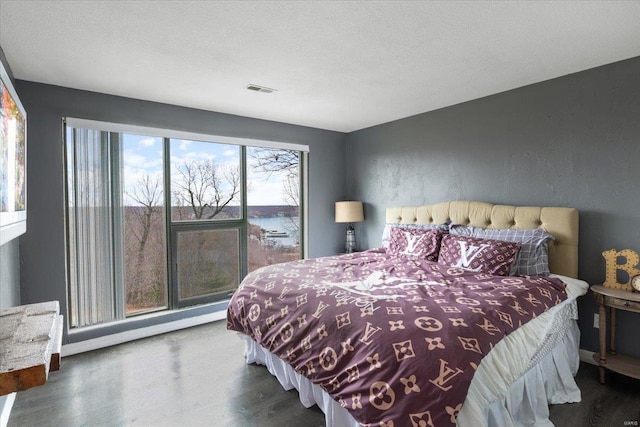 bedroom featuring wood finished floors
