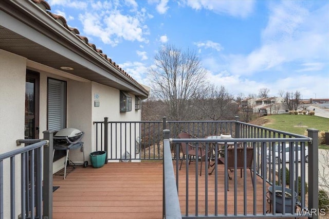 429 Racquet Club Dr Unit 3D-309, Village of Four Seasons, MO 65049 - wooden deck featuring outdoor dining space