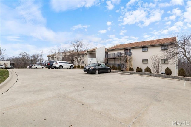 429 Racquet Club Dr Unit 3D-309, Village of Four Seasons, MO 65049 - view of street featuring curbs