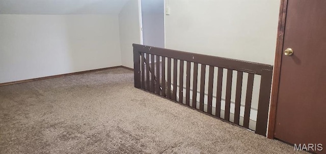 empty room with carpet flooring and baseboards
