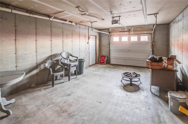 1100 W Main St, Grafton, IL 62037 - garage featuring a garage door opener
